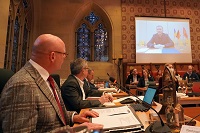 Council meeting, big screen in the ballroom