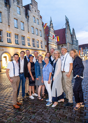 Foto der Chormitglieder auf Münsters Prinzipalmarkt