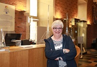Sigrid Gorlt,  Leiterin der Touristen-Information, steht in der Bürgerhalle im Historischen Rathaus der Stadt Münster