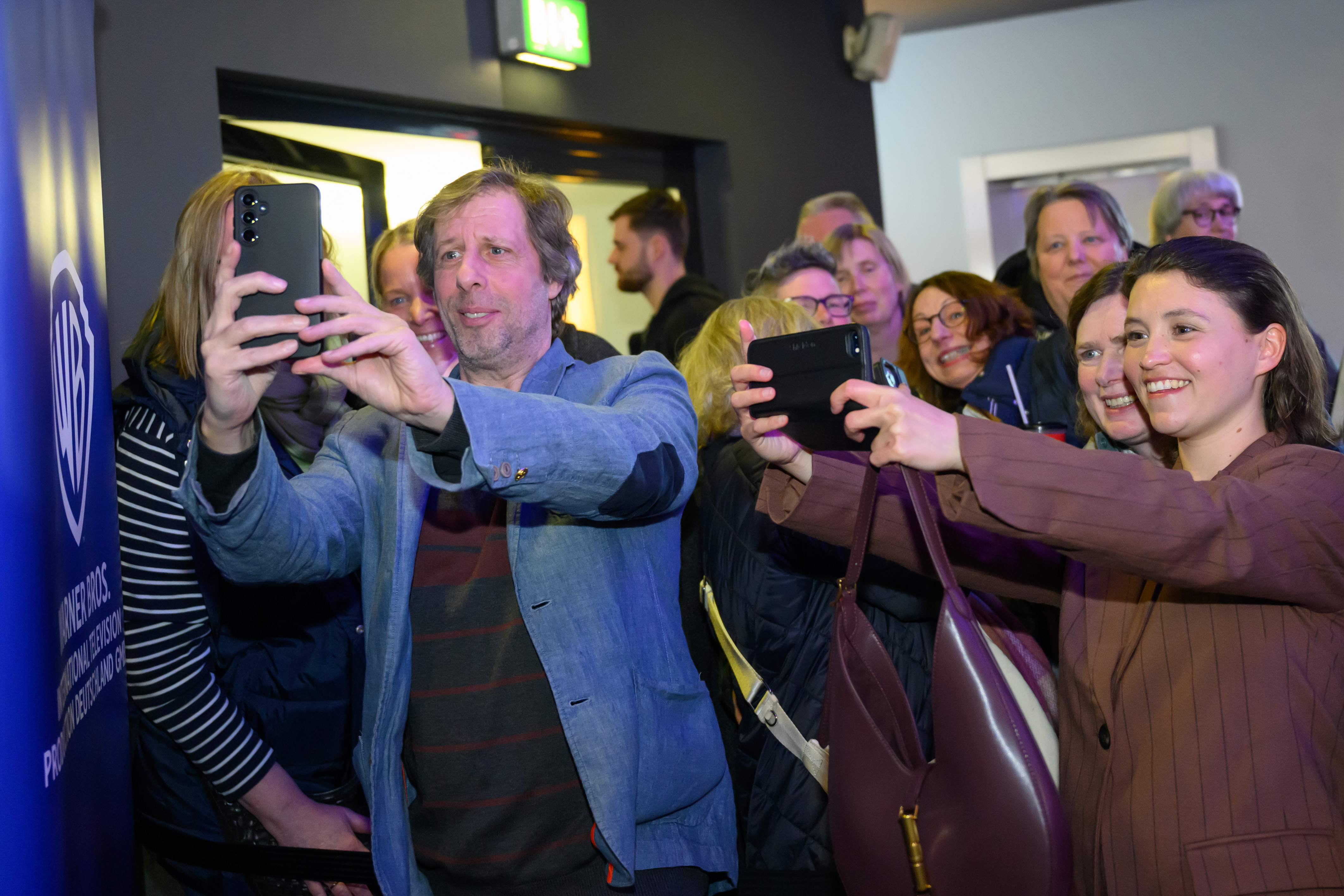 Oliver Korittke und Janina Fautz mit Fans