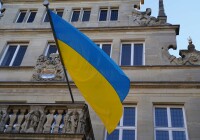 Blue and yellow flag at the Stadtweinhaus in Münster