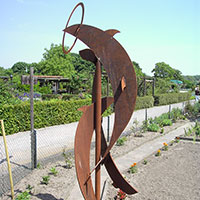 Metallskulptur: AUsgesägte Delphine