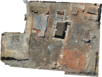 Drohnenfoto von etwa zwei Dritteln der Fläche mit neuzeitlichen Mauerzügen und Kellern
