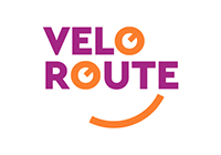 Das Logo der Velorouten zeigt einen Schriftzug und beinhaltet außerdem ein lachendes Gesicht