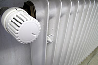 Bild einer Heizung mit Thermostat.