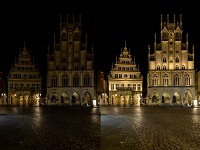 Das erleuchtete Rathaus in Münster bei Nacht