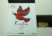 Plakat zur Friedensausstellung Foto
